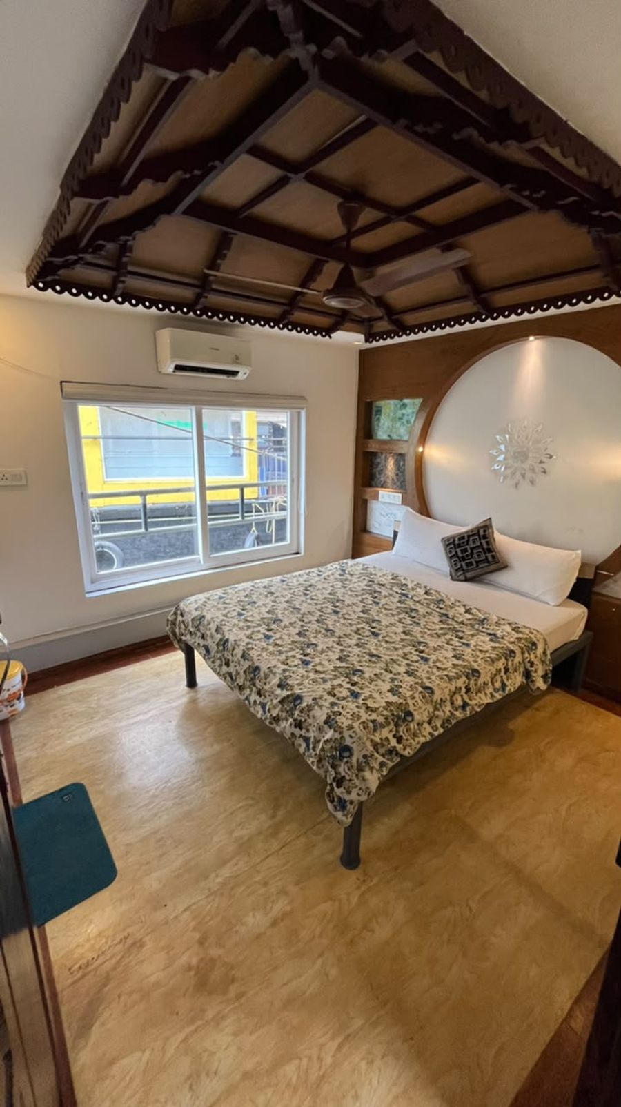 A houseboat bedroom with a double bed